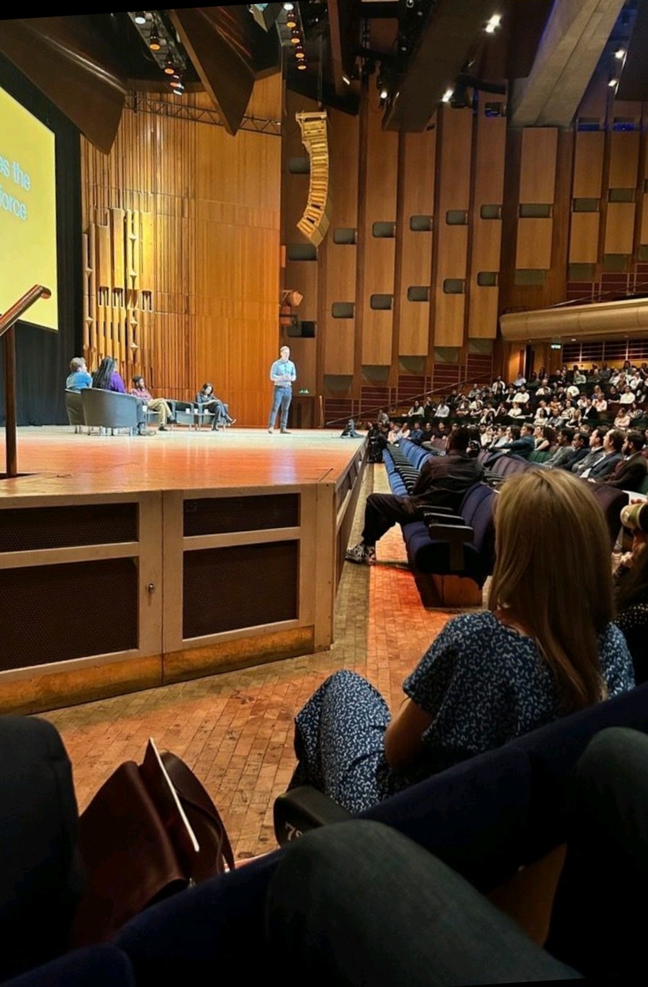 Delivering to a full auditorium at an industry conference